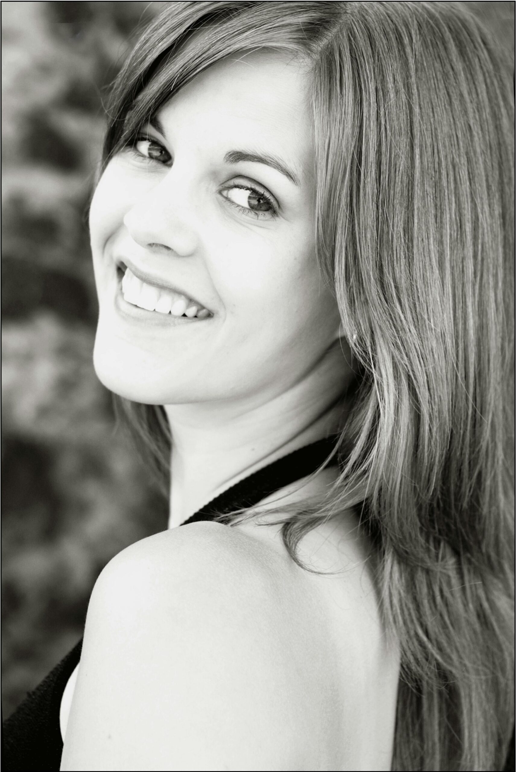 Grayscale Photography of Smiling Woman Wearing Sleeveless Top