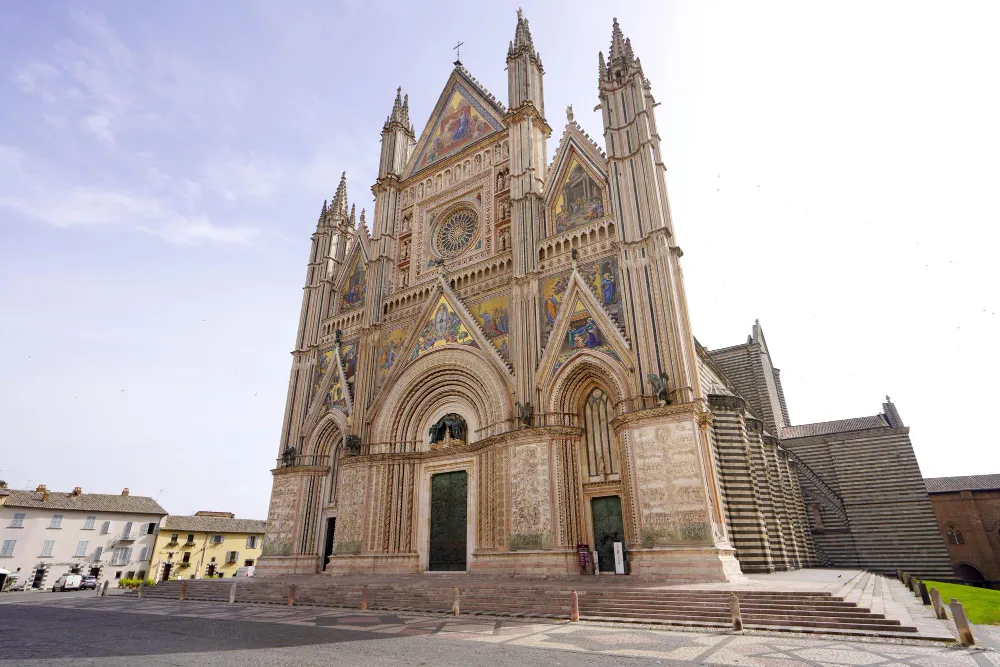 Italy Moto Tours Ornate Gothic facade of Orvieto Cathedral in Umbria, Italy