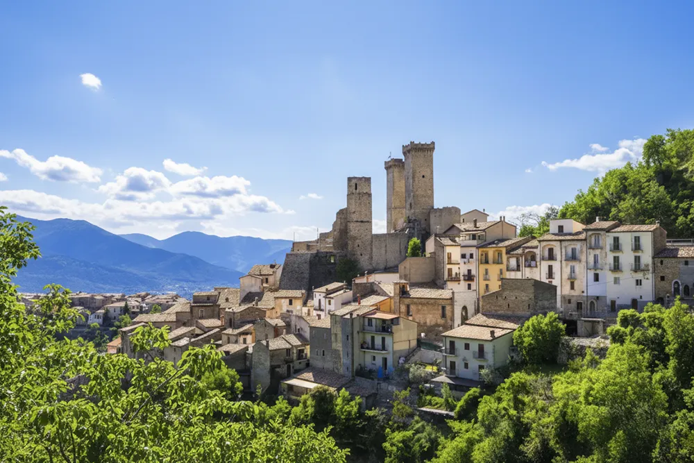 Italy Moto Tours Medieval towers and stone houses of Pacentro in the mountains of Abruzzo, Italy